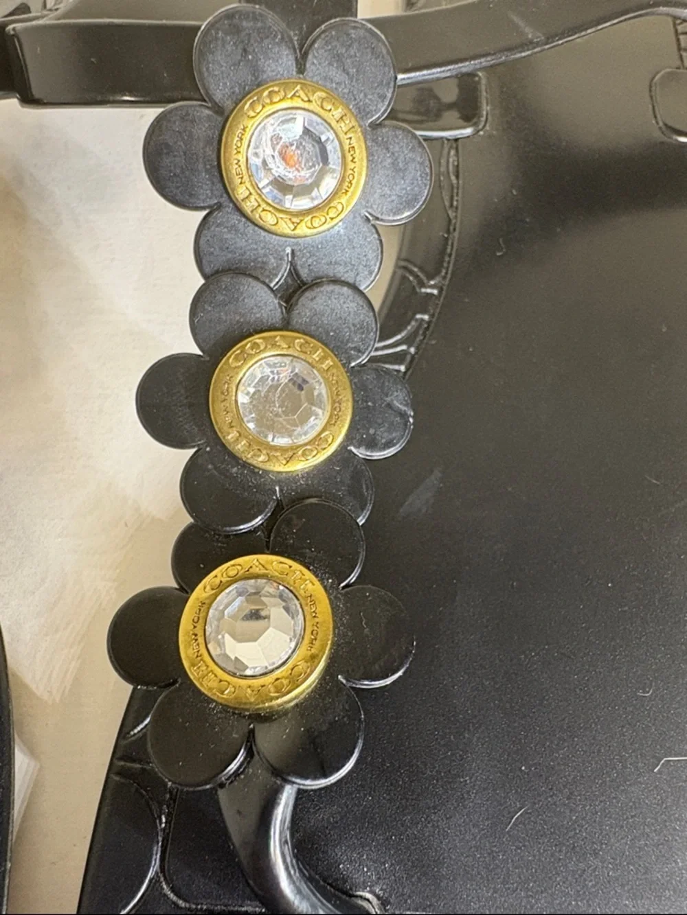 Coach Black Jelly Floral T-Strap Sandals with Gold Accents - Picture 3 of 6